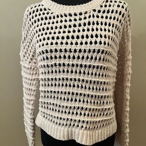Women’s size M sweater.